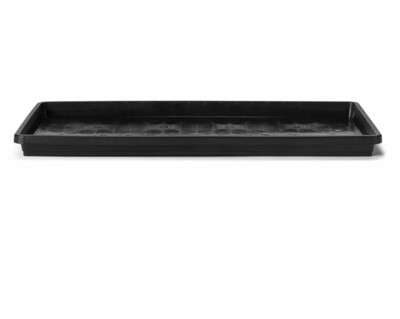 Side view of a plastic black rectangular tray on a white background.