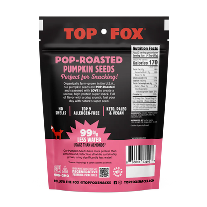 Black and pink Top Fox Pop-Roasted Pumpkin Seeds packaging with nutritional content.