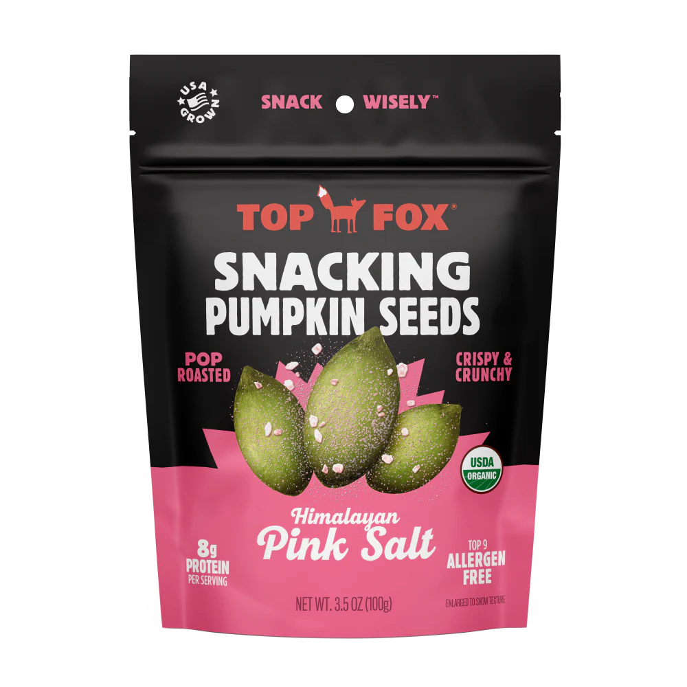 Bag of Top Fox Pop-Roasted Himalayan Pink Salt Pumpkin Seeds featuring green seeds against a black and pink package with USDA Organic seal.