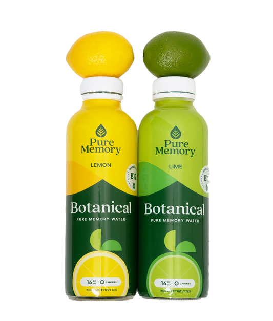 Two bottles of Pure Memory Botanical Pure Memory Water, one lemon and one lime flavored, on a white background.