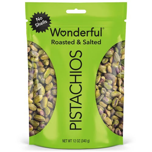 Bright green bag of Wonderful Roasted & Salted No Shells Pistachios showing shelled, roasted, & salted pistachios on a white background.